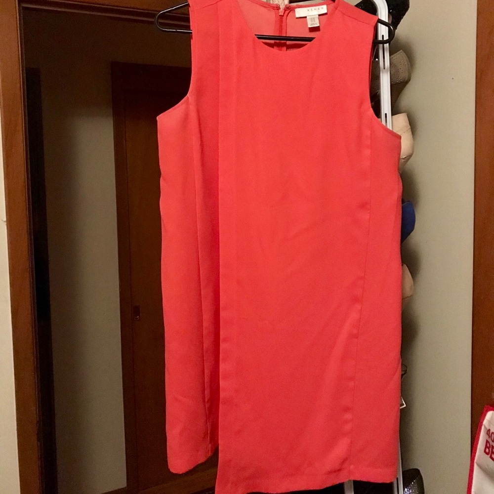 Flirty little orange asymmetrical dress!